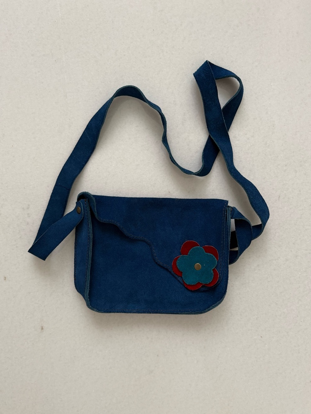 Blue Suede Crossbody Bag with Flower Accent